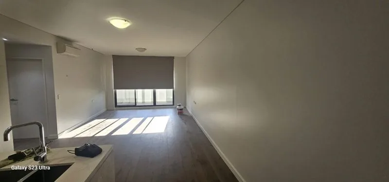 Freshly painted apartment kitchen and living area